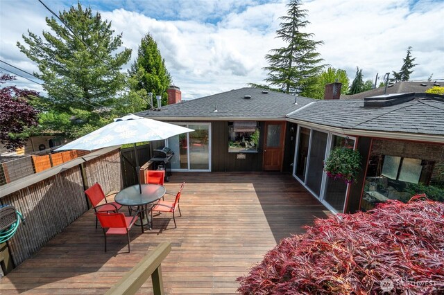 4245 Williams Ave W, Seattle, WA 98199 - wooden deck with outdoor dining area