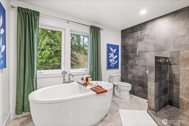 33025 129th Way SE, Auburn, WA 98092 - bathroom with a freestanding tub, toilet, recessed lighting, and tiled shower