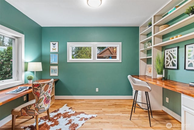 33025 129th Way SE, Auburn, WA 98092 - office area with built in study area, light wood finished floors, and baseboards