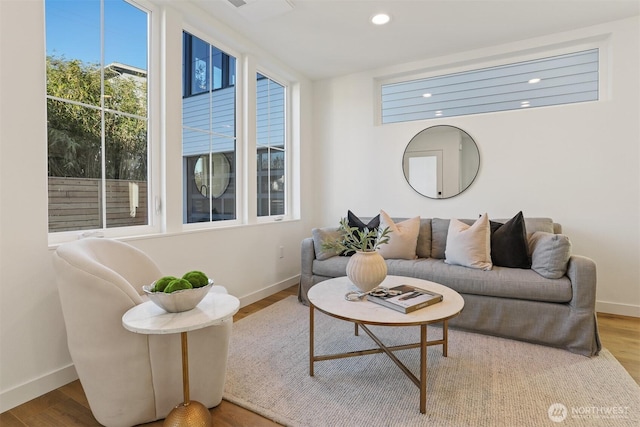 8757B Palatine Ave N, Seattle, WA 98103 - living room with baseboards, wood finished floors, and recessed lighting