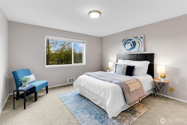 2040 13th Ave W Unit 13, Seattle, WA 98119 - bedroom with light colored carpet and baseboards