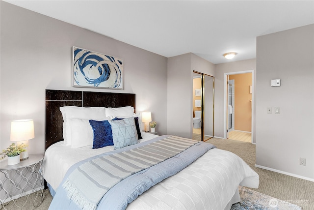 2040 13th Ave W Unit 13, Seattle, WA 98119 - carpeted bedroom featuring baseboards and a closet