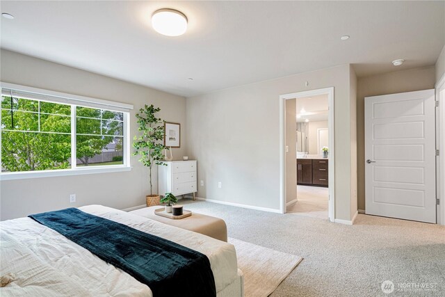 14126 SE 240th Pl, Kent, WA 98042 - bedroom featuring light carpet, baseboards, and ensuite bath