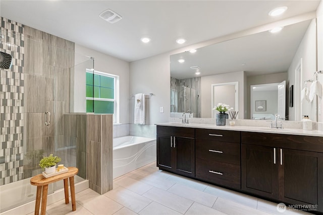 14126 SE 240th Pl, Kent, WA 98042 - full bathroom featuring a stall shower, a bath, double vanity, recessed lighting, and tile patterned flooring