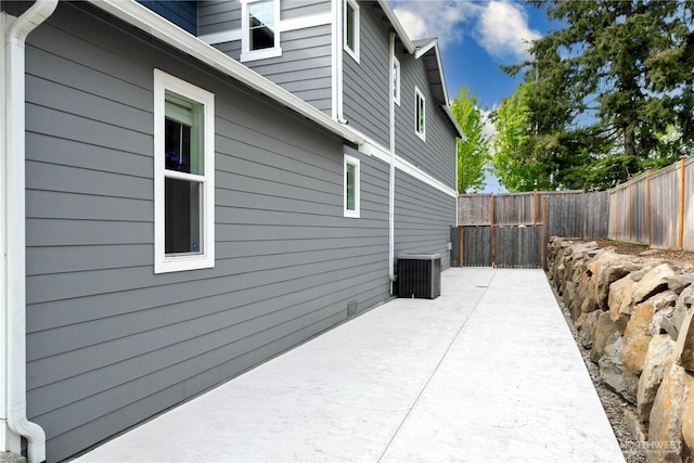 14126 SE 240th Pl, Kent, WA 98042 - view of side of home with a patio, central AC, and a fenced backyard