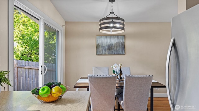 3953 153rd Ave SE, Bellevue, WA 98006 - dining area featuring wood finished floors and a chandelier