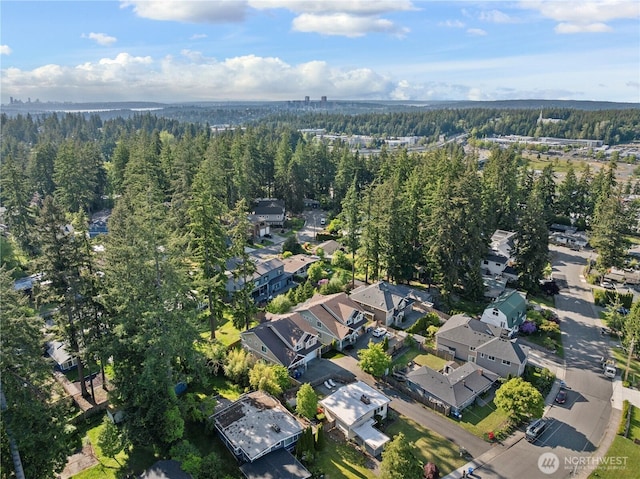 3953 153rd Ave SE, Bellevue, WA 98006 - aerial overview of property's location featuring a forest and nearby suburban area