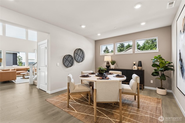769 SE 12th Pl Unit 29, North Bend, WA 98045 - dining space featuring wood finished floors, recessed lighting, and baseboards