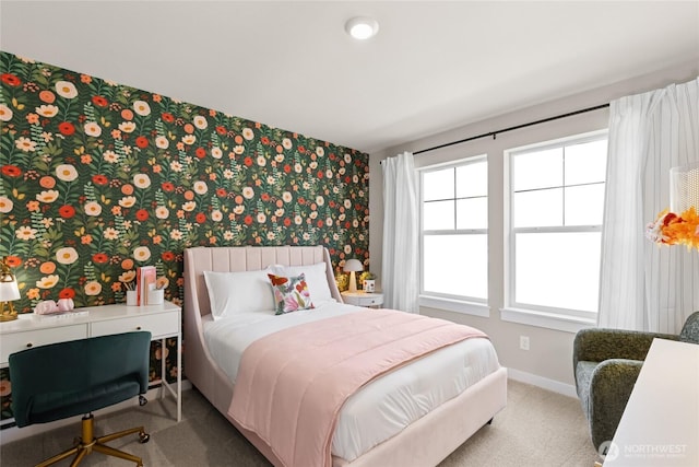 769 SE 12th Pl Unit 29, North Bend, WA 98045 - bedroom with wallpapered walls, baseboards, carpet, and an accent wall