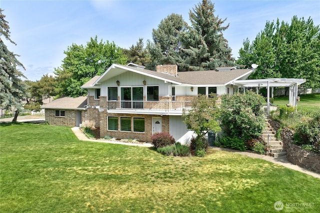 415 Snow Mass Ln, Yakima, WA 98908 - back of house featuring a chimney, a lawn, brick siding, and stairs