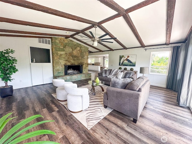 415 Snow Mass Ln, Yakima, WA 98908 - living area featuring ceiling fan, wood finished floors, a stone fireplace, and baseboards