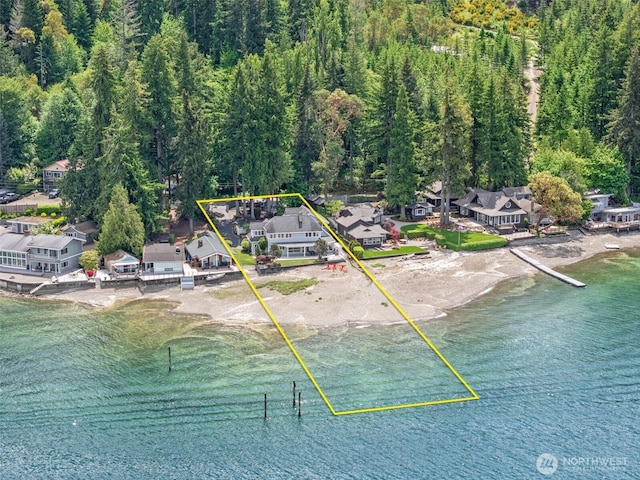 11521 E State Route 106, Union, WA 98592 - aerial view of residential area with property boundaries highlighted, a large body of water, and a heavily wooded area