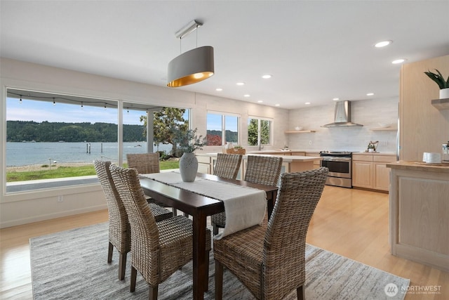 11521 E State Route 106, Union, WA 98592 - dining space with light wood finished floors, recessed lighting, and baseboards
