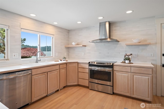 11521 E State Route 106, Union, WA 98592 - kitchen with stainless steel appliances, exhaust hood, open shelves, a sink, and recessed lighting