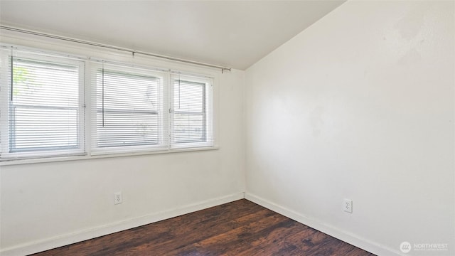309 E Sumach St, Walla Walla, WA 99362 - spare room with dark wood-style floors, baseboards, plenty of natural light, and lofted ceiling