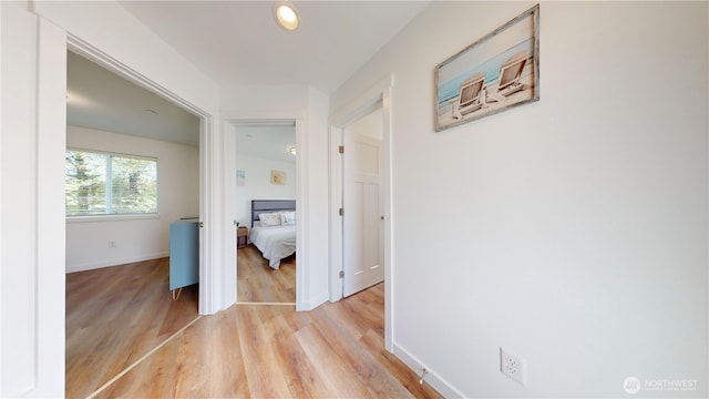 890 Magellan Ave NE Unit 2, Ocean Shores, WA 98569 - hall featuring light wood-style flooring, baseboards, and recessed lighting