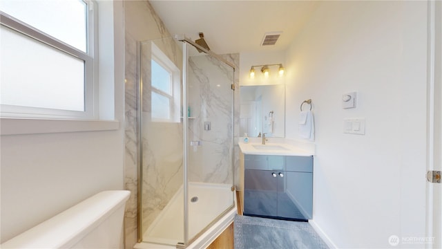 890 Magellan Ave NE Unit 2, Ocean Shores, WA 98569 - full bath with a marble finish shower, vanity, and toilet