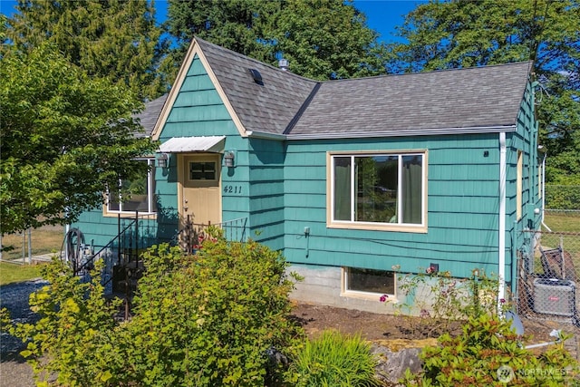 4211 108th Ave E, Edgewood, WA 98372 - view of front of house featuring roof with shingles