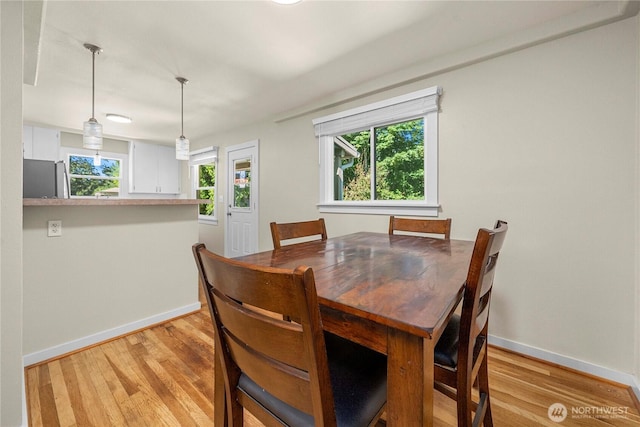 4211 108th Ave E, Edgewood, WA 98372 - dining area with light wood-type flooring