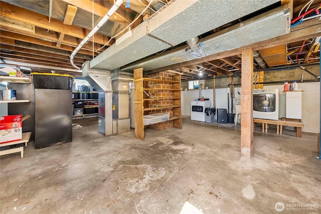 4211 108th Ave E, Edgewood, WA 98372 - unfinished basement featuring washer and clothes dryer and heating unit