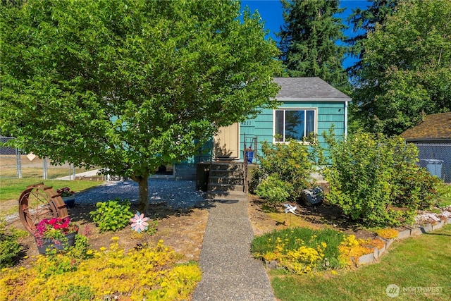 4211 108th Ave E, Edgewood, WA 98372 - view of property hidden behind natural elements with a shingled roof