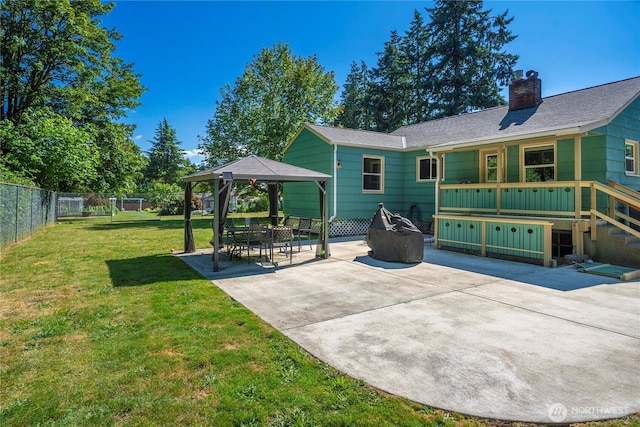 4211 108th Ave E, Edgewood, WA 98372 - fenced backyard with a gazebo and a patio area