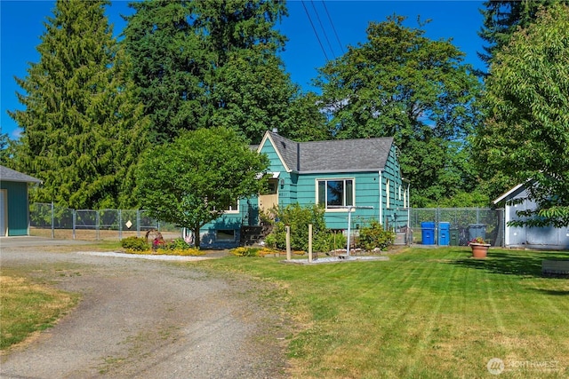4211 108th Ave E, Edgewood, WA 98372 - view of front of home featuring a shingled roof and driveway