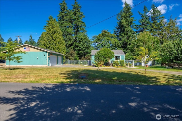 4211 108th Ave E, Edgewood, WA 98372 - view of front facade with an outbuilding and a garage