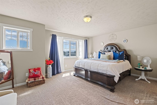 301 K St NE, Quincy, WA 98848 - carpeted bedroom featuring a textured ceiling and baseboards