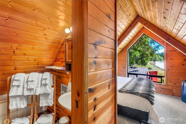 11318 583rd Ave E, Enumclaw, WA 98022 - bedroom featuring lofted ceiling, wooden ceiling, wood walls, and carpet