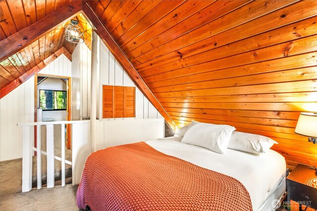 11318 583rd Ave E, Enumclaw, WA 98022 - bedroom with carpet, vaulted ceiling, wooden ceiling, and wood walls