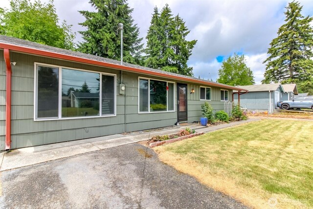 13812 Golden Given Rd E, Tacoma, WA 98445 - single story home featuring a front lawn