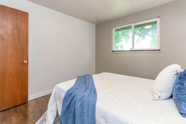 13812 Golden Given Rd E, Tacoma, WA 98445 - bedroom with wood finished floors and baseboards