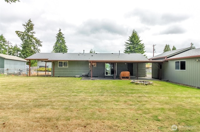 13812 Golden Given Rd E, Tacoma, WA 98445 - rear view of property with a fire pit and a patio