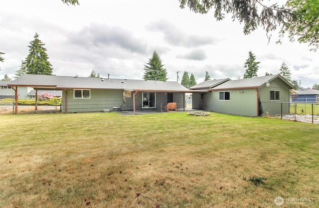 13812 Golden Given Rd E, Tacoma, WA 98445 - back of house featuring a patio area and a fire pit