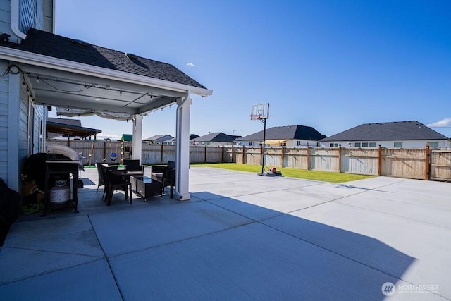 733 K St NE, Quincy, WA 98848 - fenced backyard with a patio, grilling area, and a residential view