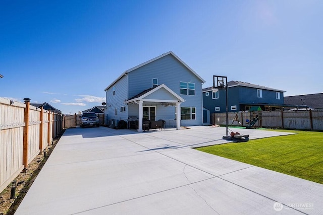 733 K St NE, Quincy, WA 98848 - back of property with a patio, a playground, and concrete driveway