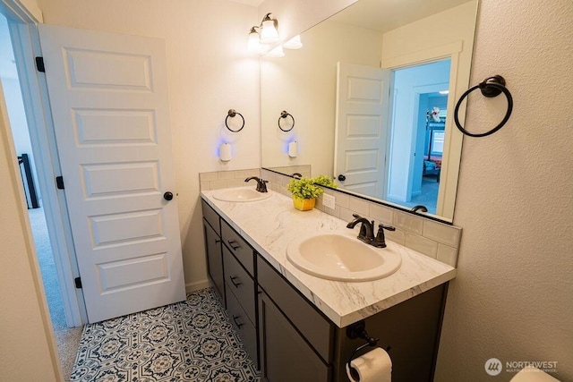 733 K St NE, Quincy, WA 98848 - full bathroom with double vanity and tile patterned floors