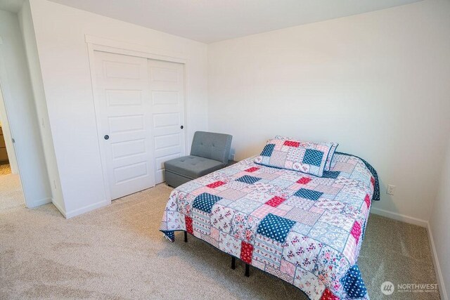 733 K St NE, Quincy, WA 98848 - carpeted bedroom featuring a closet and baseboards