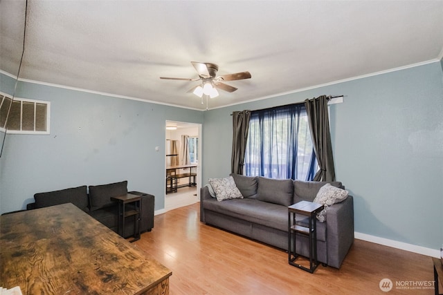 2395 SE Salmonberry Rd, Port Orchard, WA 98366 - living room with ceiling fan, light wood finished floors, crown molding, and baseboards