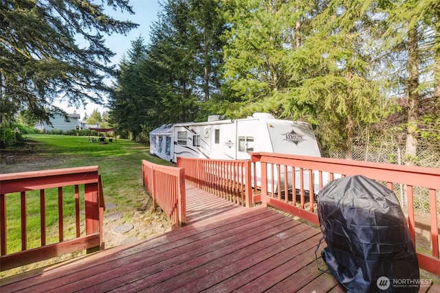 2395 SE Salmonberry Rd, Port Orchard, WA 98366 - wooden deck with a lawn and area for grilling