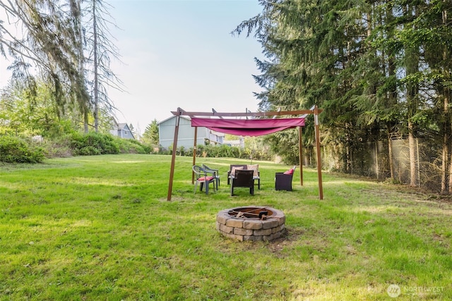2395 SE Salmonberry Rd, Port Orchard, WA 98366 - view of grassy yard featuring an outdoor fire pit