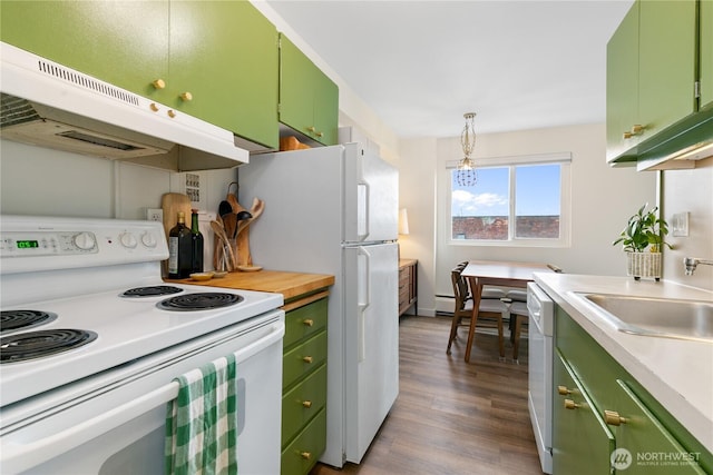 1200 Boylston Ave Unit 505, Seattle, WA 98101 - kitchen with white appliances, green cabinets, under cabinet range hood, dark wood finished floors, and a sink