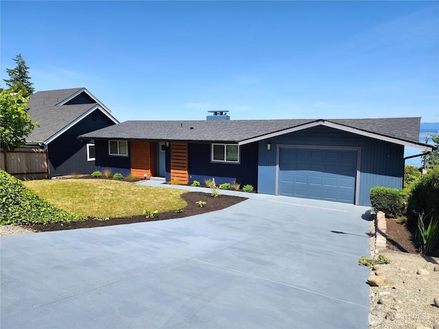 1345 Rainbow Ln, Camano Island, WA 98282 - single story home featuring a garage, driveway, and roof with shingles