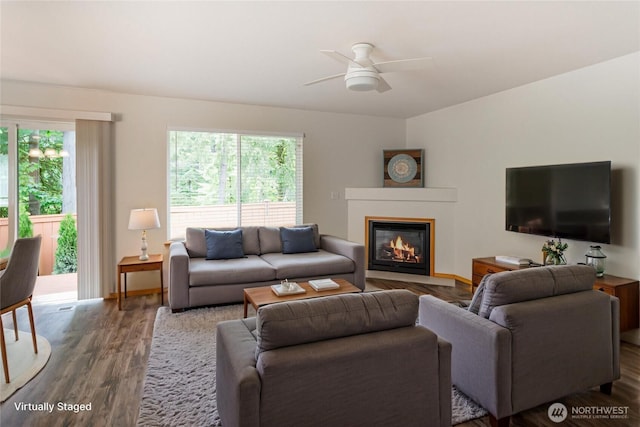 821 Sarah Ct NW, Olympia, WA 98502 - living area featuring a ceiling fan, a glass covered fireplace, and wood finished floors