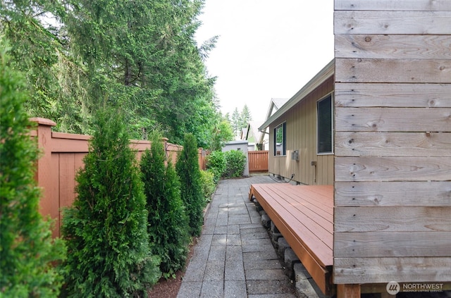821 Sarah Ct NW, Olympia, WA 98502 - view of side of property featuring a fenced backyard and a wooden deck
