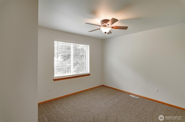 821 Sarah Ct NW, Olympia, WA 98502 - carpeted empty room with ceiling fan and baseboards