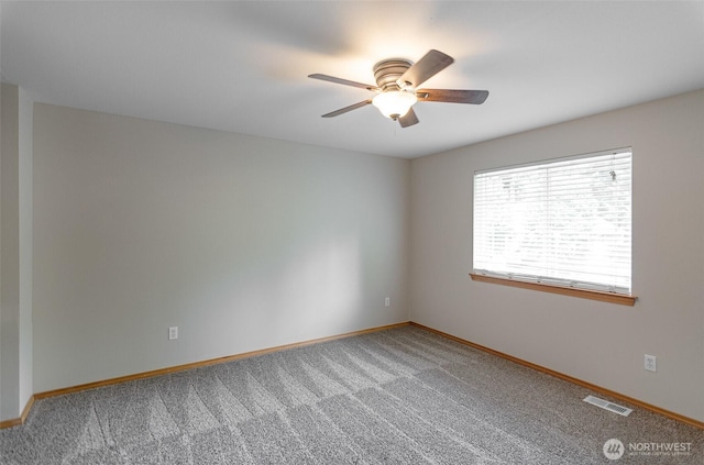 821 Sarah Ct NW, Olympia, WA 98502 - carpeted spare room with a ceiling fan and baseboards