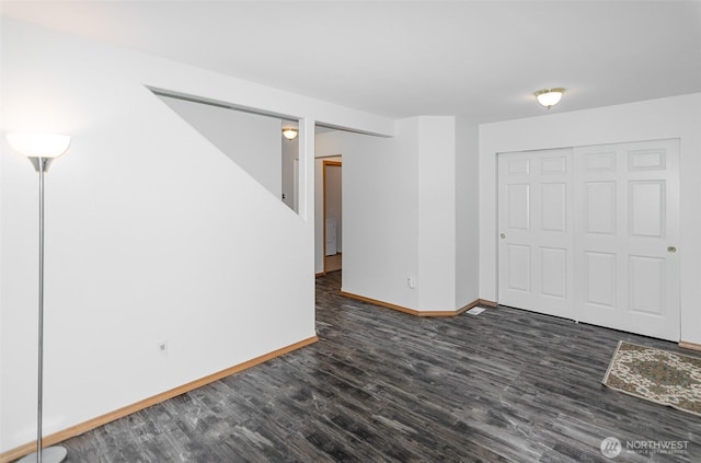 821 Sarah Ct NW, Olympia, WA 98502 - unfurnished room with wood finished floors and baseboards