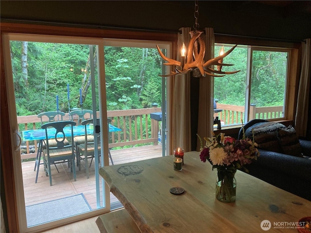 291 Williams Rd, Ariel, WA 98603 - dining room with healthy amount of natural light and a chandelier